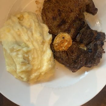 Firebirds Wood Fired Grill - Cajun Ribeye* with Parmesan Mashed Potatoes - Steakhouses Near Me - Chadds Ford, Pennsylvania