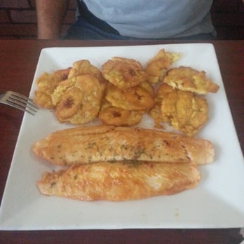 Las Americas Restaurant - Tostones(fried plantains) with grouper. - Dominican Near Me - West Palm Beach, Florida Las Americas Restaurant - Tostones(fried plantains) with grouper. - Dominican Near Me - West Palm Beach, Florida