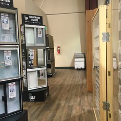 The Moulding Door and Floor Store - Pathway between molding display and our shower and wardrobe enclosure displays.