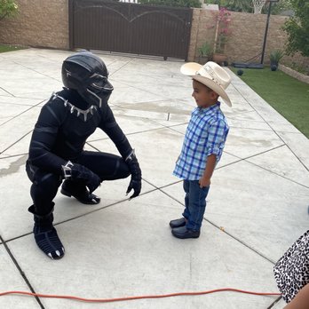 Enchanted Characters - Black panther talking to the birthday boy !! - Party Characters Near Me Enchanted Characters - Black panther talking to the birthday boy !! - Party Characters Near Me