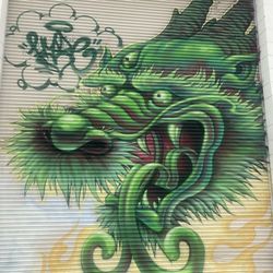 Dragon School murals - Green dragon with 3,eyes in fight mode..