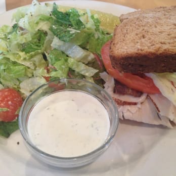 The Windmill Bistro - Half chopped salad & half turkey club with blue cheese dressing on the side. - Breakfast & Brunch Near Me - Sumner, Washington The Windmill Bistro - Half chopped salad & half turkey club with blue cheese dressing on the side. - Breakfast & Brunch Near Me - Sumner, Washington