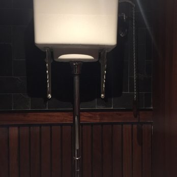 Dishoom - Old fashioned toilet tank - Indian Near Me - London, XGL Dishoom - Old fashioned toilet tank - Indian Near Me - London, XGL