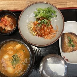 Cheong-Guk Jang soup with a grilled fish and side banchans.