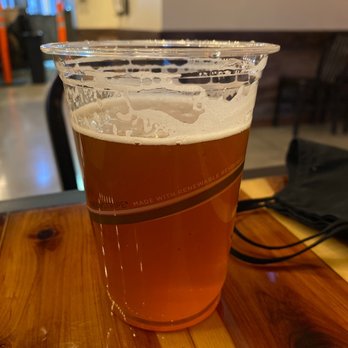 Sew Hop'd - a glass of beer on a table - Pubs Near Me - Huntley, Illinois