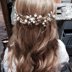 HK Hair Color Specialist - A half updo with added baby's breath to match the brides wedding flowers.