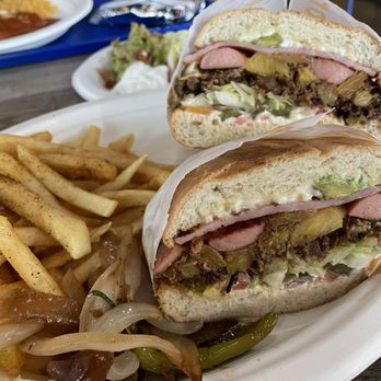Taqueria El Arquito - Torta Cubana, but added pineapple as well - Mexican Near Me - Dallas, Texas Taqueria El Arquito - Torta Cubana, but added pineapple as well - Mexican Near Me - Dallas, Texas