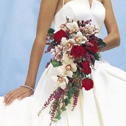 Providence Florist - Fabulous Weddings... Fall into a magical daydream with orchids and roses. For a true believer... of the heart.