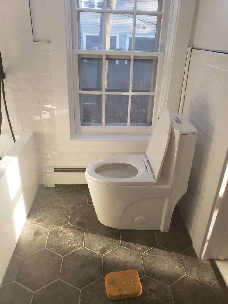 Slide of Tiulux Plumbing