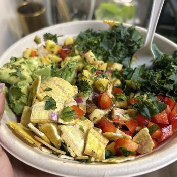 Spiced Black - Coconut curry bowl with mango salsa, red bell peppers, kale lettuce, avocado, and plantain chips - Soul Food Near Me - Upper Marlboro, Maryland