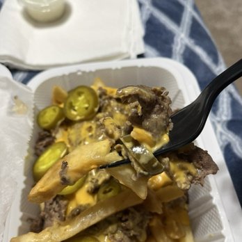 Maple Lawn Pizza & Subs - Loaded fries bite - Pizza Near Me - Fulton, Maryland Maple Lawn Pizza & Subs - Loaded fries bite - Pizza Near Me - Fulton, Maryland