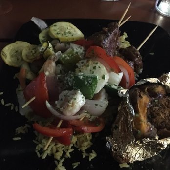 Riptides Raw Bar & Grill - Delicious. Grilled skewers meal with baked sweet potato. - Seafood Near Me - Ormond Beach, Florida Riptides Raw Bar & Grill - Delicious. Grilled skewers meal with baked sweet potato. - Seafood Near Me - Ormond Beach, Florida