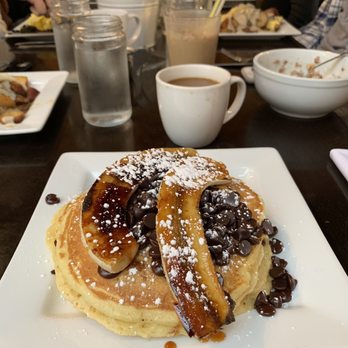Rooster - Downtown - Pancakes with chocolate chips and the caramelized bananas (not a combination on the menu but highly recommended) - Creperies Near Me - St. Louis, Missouri Rooster - Downtown - Pancakes with chocolate chips and the caramelized bananas (not a combination on the menu but highly recommended) - Creperies Near Me - St. Louis, Missouri