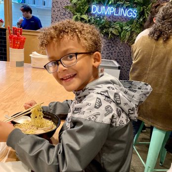Ramen By Uzu - Happy kid with his favorite food. - Ramen Near Me - Washington, DC, District of Columbia Ramen By Uzu - Happy kid with his favorite food. - Ramen Near Me - Washington, DC, District of Columbia
