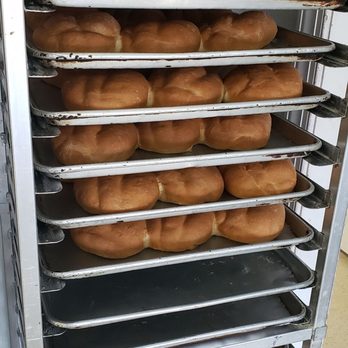 Odalys Panaderia Y Pasteleria - a rack of doughnuts - Bakeries Near Me - Concord, North Carolina Odalys Panaderia Y Pasteleria - a rack of doughnuts - Bakeries Near Me - Concord, North Carolina