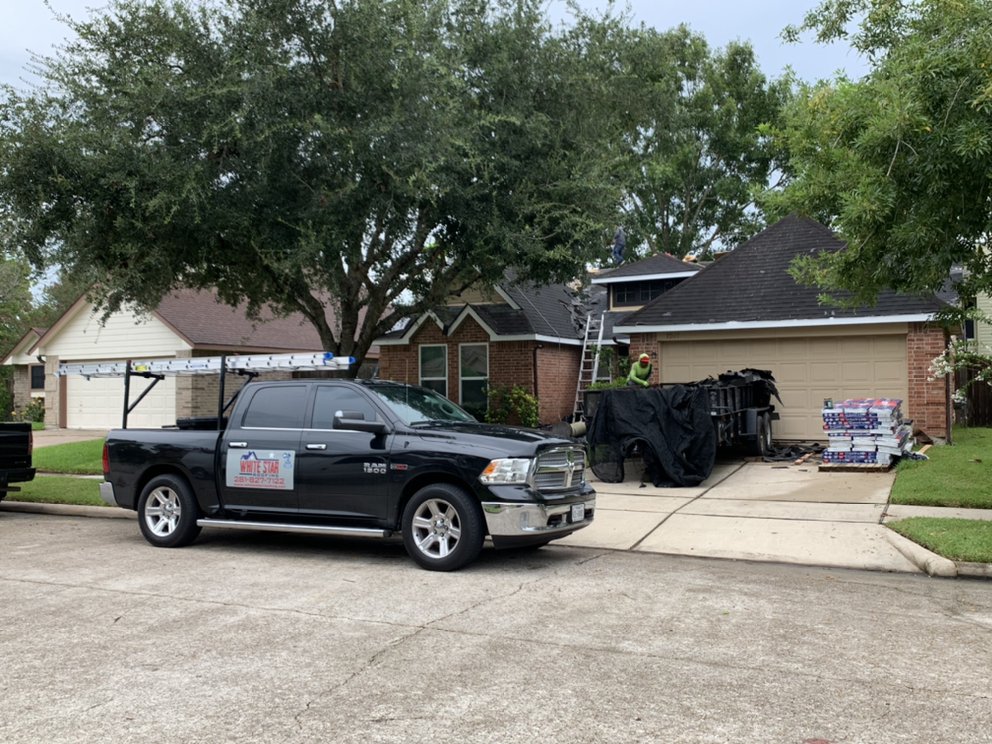 Slide of White Star Roofing