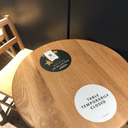 Starbucks - All the tables have this labeling.