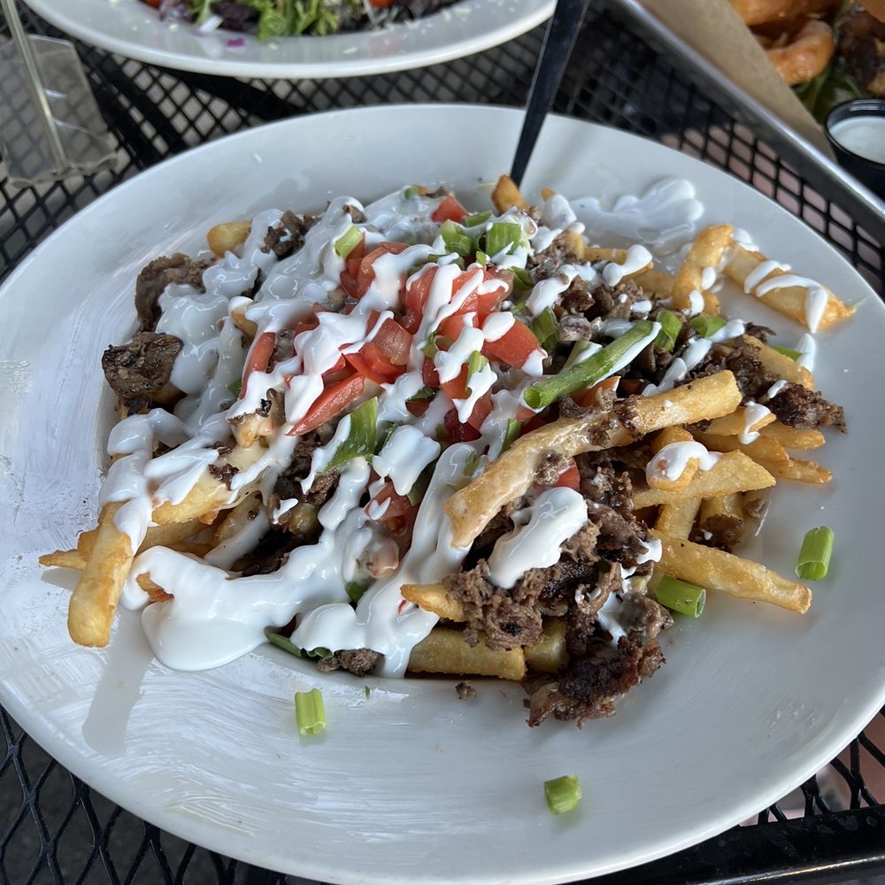Juniors' - Carne Asada fries is delicious and love all the sour cream! - American Near Me - Tracy, California