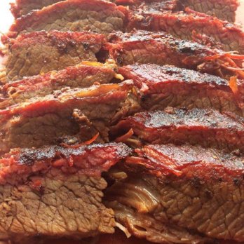Treehouse BBQ - sliced beef on a cutting board - Food Trucks Near Me - Colorado Springs, Colorado Treehouse BBQ - sliced beef on a cutting board - Food Trucks Near Me - Colorado Springs, Colorado