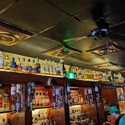 Seanachai Whiskey & Cocktail Bar - Behind the bar, all brands of Irish liquor.