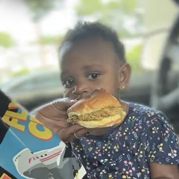Spry’s Durty Kitchen - Our youngest God daughter enjoying a classic pull pork sandwich - Caterers Near Me Spry’s Durty Kitchen - Our youngest God daughter enjoying a classic pull pork sandwich - Caterers Near Me