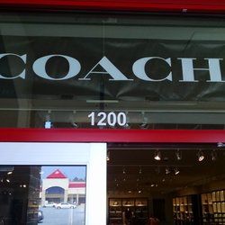 Coach Factory Store - Enter here. I love the red frame around the sign. Details matter!