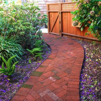 Shambhala Landscapes - The curving brick pathway is charming and a focus of the garden. - Landscaping Near Me Shambhala Landscapes - The curving brick pathway is charming and a focus of the garden. - Landscaping Near Me