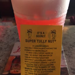 a drink in a plastic cup a drink in a plastic cup