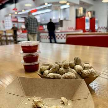 Five Guys - Complimentary nuts while waiting for order. - Burgers Near Me - Happy Valley, Oregon Five Guys - Complimentary nuts while waiting for order. - Burgers Near Me - Happy Valley, Oregon