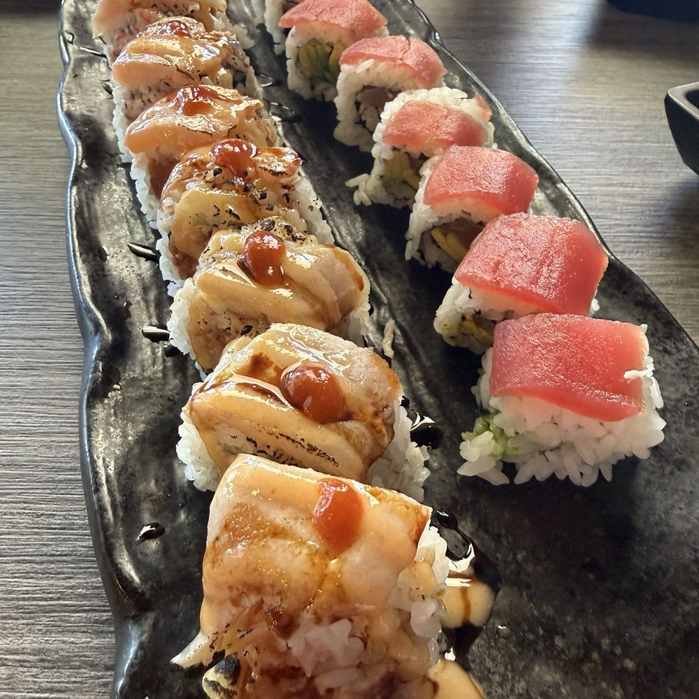Sushi Tsunami - Flaming dragon (left) and cherry blossom roll (right) - Sushi Bars Near Me - Pleasant Hill, California Sushi Tsunami - Flaming dragon (left) and cherry blossom roll (right) - Sushi Bars Near Me - Pleasant Hill, California