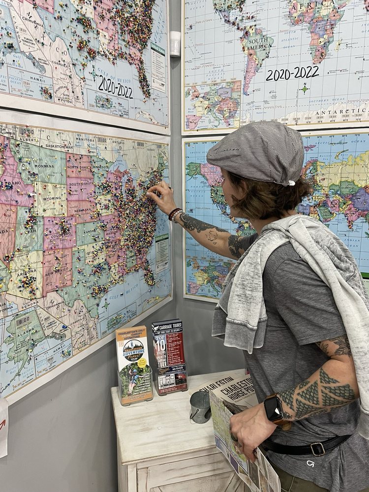 Placing a pin on the "where are you from" map in the check-in ticket area :)