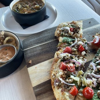 Akres - Sausage Kale soup, Calamari & Spinach Artichoke Olive Flatbread. - Mediterranean Near Me - Astoria, Oregon
