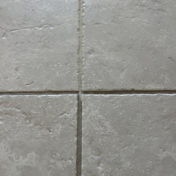 Doctor Tile Restoration Space Coast - This is the first coat and showing the old grout lines with the beautiful new color! - Flooring Near Me - Melbourne, Florida Doctor Tile Restoration Space Coast - This is the first coat and showing the old grout lines with the beautiful new color! - Flooring Near Me - Melbourne, Florida