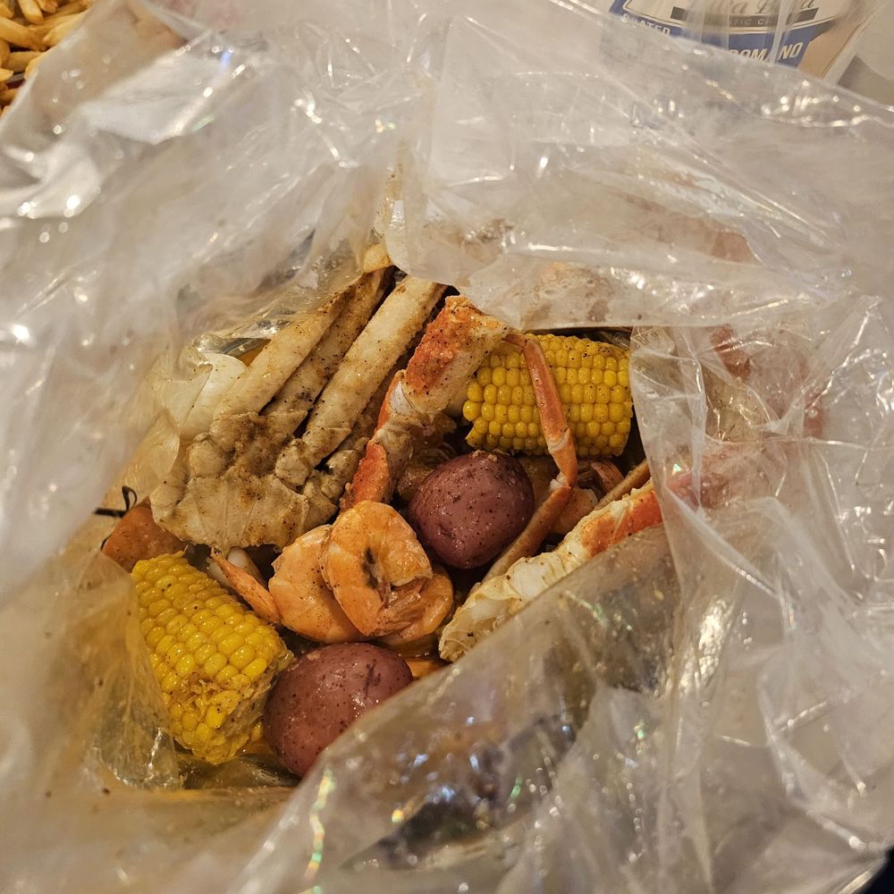 Snow crab, shrimp, potatoes, eggs & sweet corn in an old bay, lemon pepper, garlic butter sauce Snow crab, shrimp, potatoes, eggs & sweet corn in an old bay, lemon pepper, garlic butter sauce