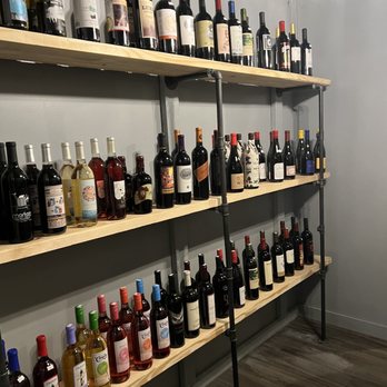 Brunswick Beer Xchange - a wall of wine bottles - Beer Bar Near Me - Leland, North Carolina Brunswick Beer Xchange - a wall of wine bottles - Beer Bar Near Me - Leland, North Carolina