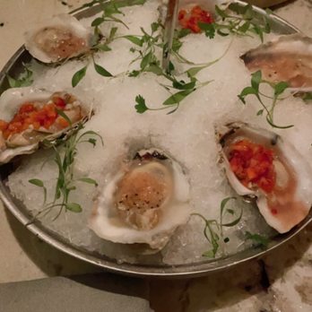 Yardbird - Oysters Appetizer (topped with fruit) - New American Near Me - Washington, DC, District of Columbia Yardbird - Oysters Appetizer (topped with fruit) - New American Near Me - Washington, DC, District of Columbia