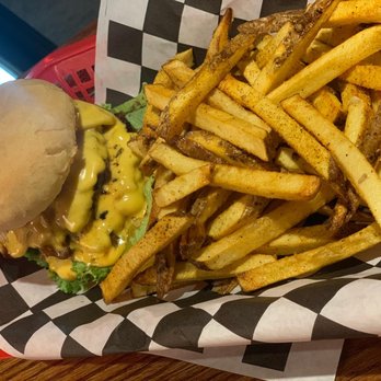 Texas Wagon Wheel - Bison double cheeseburger with seasoned fresh cut fries. - Bars Near Me - Proctor, West Virginia Texas Wagon Wheel - Bison double cheeseburger with seasoned fresh cut fries. - Bars Near Me - Proctor, West Virginia
