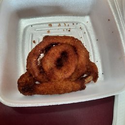 What's left of a petrified small onion ring. So burnt and over salted What's left of a petrified small onion ring. So burnt and over salted