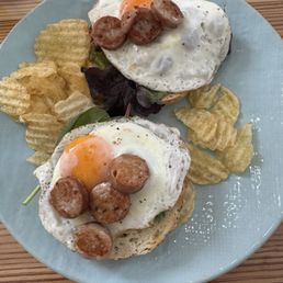 Avocado bagel toast with chicken sausage. Avocado bagel toast with chicken sausage.