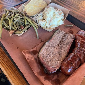 Evie Mae's Pit Barbecue - 2 Meat Combo Plate: Brisket, Green Chile and Cheddar Sausage, Potato Salad, Green Beans, and Grits - Barbeque Near Me - Wolfforth, Texas Evie Mae's Pit Barbecue - 2 Meat Combo Plate: Brisket, Green Chile and Cheddar Sausage, Potato Salad, Green Beans, and Grits - Barbeque Near Me - Wolfforth, Texas