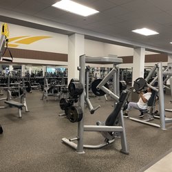 There are regular announcements to re-rack your weights!! Love this.