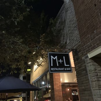 Main + Lincoln - Exterior of building with some seating outdoors. - New American Near Me - Valparaiso, Indiana