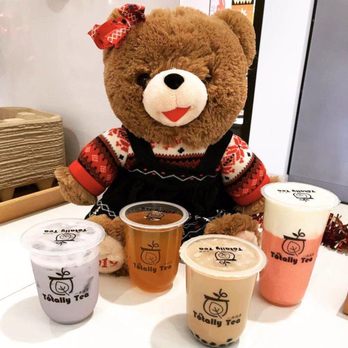 Totally Tea - a teddy bear sitting at a table with drinks - Bubble Tea Near Me - Novi, Michigan Totally Tea - a teddy bear sitting at a table with drinks - Bubble Tea Near Me - Novi, Michigan