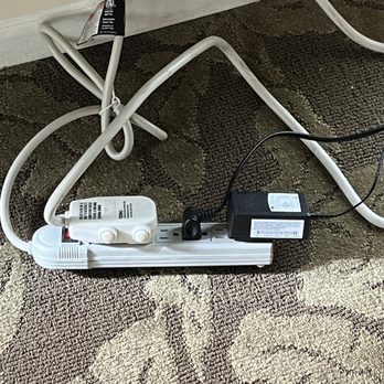 Best Western Plus Island Palms Hotel & Marina - This is a power strip with the in room air conditioner unit plugged into it and the television. Fire hazard. - San Diego, CA