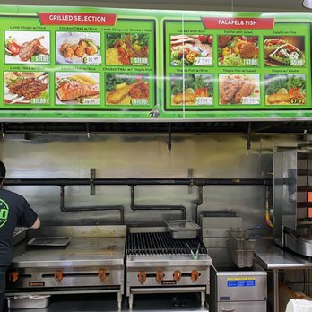 Gyro King - a man working in a restaurant kitchen - Falafel Near Me - Brooklyn, New York Gyro King - a man working in a restaurant kitchen - Falafel Near Me - Brooklyn, New York