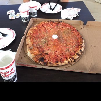 Regina Pizzeria - Cheese pizza with cheese, oregano and peppers added - Pizza Near Me - Burlington, Massachusetts Regina Pizzeria - Cheese pizza with cheese, oregano and peppers added - Pizza Near Me - Burlington, Massachusetts