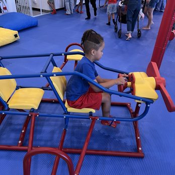 We Rock The Spectrum - A teeter totter designed as airplane - Indoor Playcenter Near Me - Clovis, California We Rock The Spectrum - A teeter totter designed as airplane - Indoor Playcenter Near Me - Clovis, California