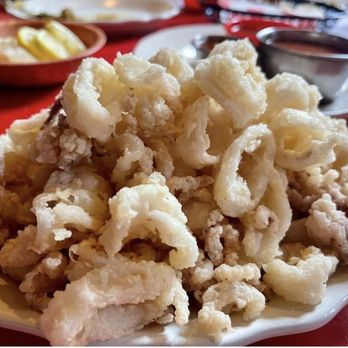 Charlie Blood's - Fried calamari. Ps the medium sauce is pretty hot and the hot sauce is the way I love it. Hot!! - Bars Near Me - Garfield, New Jersey