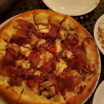 Coltivare - Pizza with Prosciutto and your choice of cheese. Everything slid off the piece with one bite. Meh. - Italian Near Me - Houston, Texas