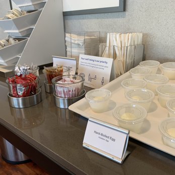 Admirals Club - a variety of desserts on a table - Airport Lounges Near Me - Philadelphia, Pennsylvania Admirals Club - a variety of desserts on a table - Airport Lounges Near Me - Philadelphia, Pennsylvania